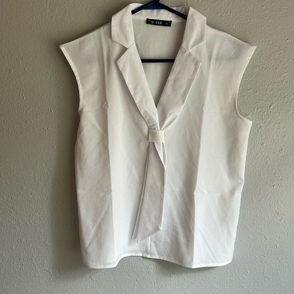 Women’s blouse, never worn, medium